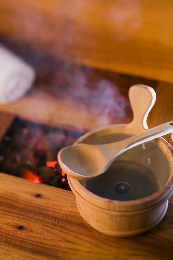 Bucket of water in sauna